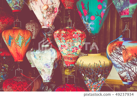 Colorful lanterns spread light on the old street Colorful lanterns spread light on the old street 49237934