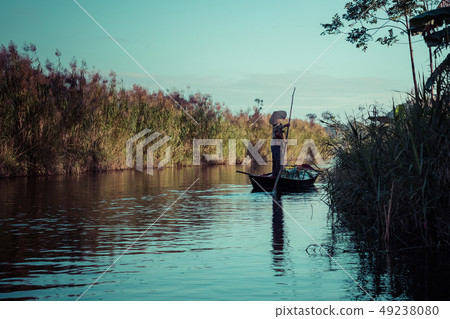 Vietnamese boat on the river. Tam Coc, Ninh Vietnamese boat on the river. Tam Coc, Ninh 49238080