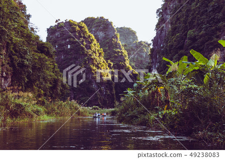 Vietnamese boat on the river. Tam Coc, Ninh Vietnamese boat on the river. Tam Coc, Ninh 49238083