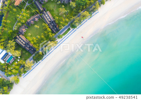 Aerial view of sandy beach with tourists swimming 49238541