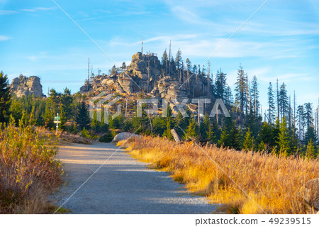 Granite rock formation with wooden cross on the top of Hochstein near Dreisesselberg, Tristolicnik Granite rock formation with wooden cross on the top of Hochstein near Dreisesselberg, Tristolicnik 49239515