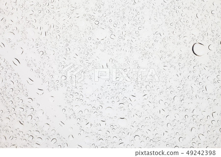 Rain droplets on glass background. 49242398