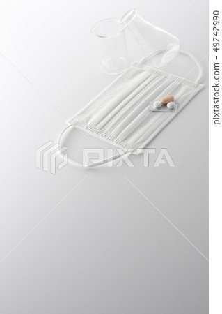 Medicine and mask 49242990