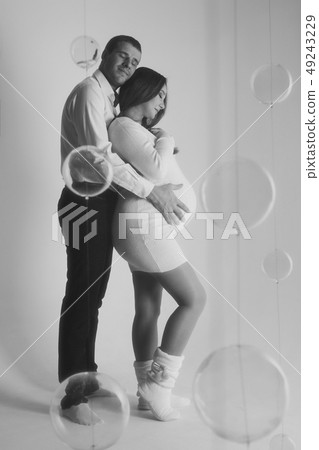 couple in love hugs on white background. man and couple in love hugs on white background. man and 49243229