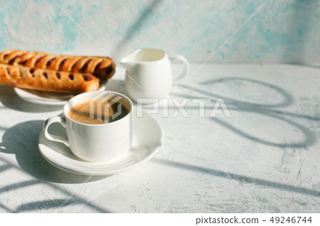 cup of coffee in the morning light, sunlight 49246744