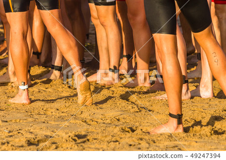 Triathlon Athletes Legs Beach Ocean Swim Triathlon Athletes Legs Beach Ocean Swim 49247394