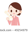 Woman in pink pajamas drinking hot milk 49254979