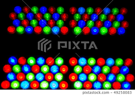 LED lights. Multi-colored light bulbs for illumination. Texture of colored light bulbs in the dark. 49258083