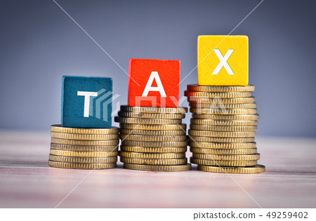 colorful cube with word TAX and stacking coin colorful cube with word TAX and stacking coin 49259402