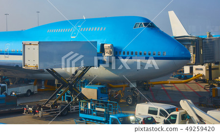 Amsterdam, Netherlands - March 11, 2016: KLM airplane parked at Schiphol airport. KLM is the flag Amsterdam, Netherlands - March 11, 2016: KLM airplane parked at Schiphol airport. KLM is the flag 49259420
