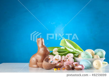 Easter chocolate bunny and eggs Easter chocolate bunny and eggs 49259899