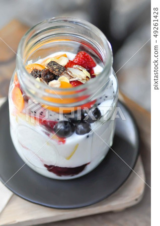 yogurt with fruit topping 49261428