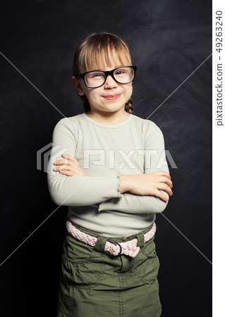 Mischievous child portrait. Happy kid girl  49263240