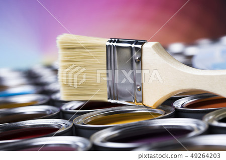 Metal tin cans with color paint and paintbrush 49264203