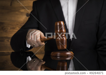 Judge, male judge in a courtroom striking the Judge, male judge in a courtroom striking the 49264871