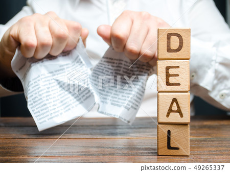 Word deal and businessman is breaking a contract 49265337
