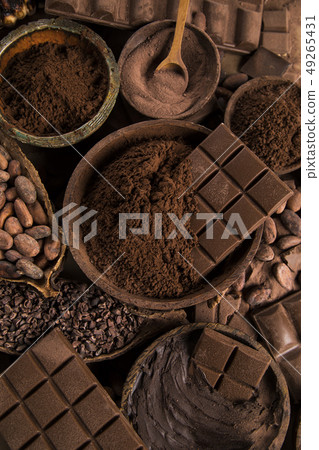 Chocolate bar, candy sweet, cacao beans and powder Chocolate bar, candy sweet, cacao beans and powder 49265431