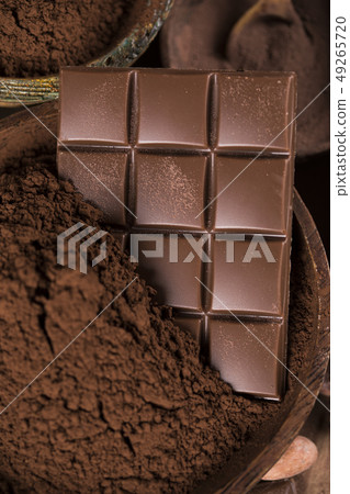 Chocolate bar, candy sweet, cacao beans and powder Chocolate bar, candy sweet, cacao beans and powder 49265720