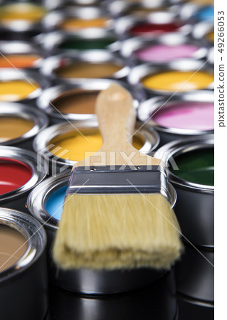 Metal tin cans with color paint and paintbrush 49266053