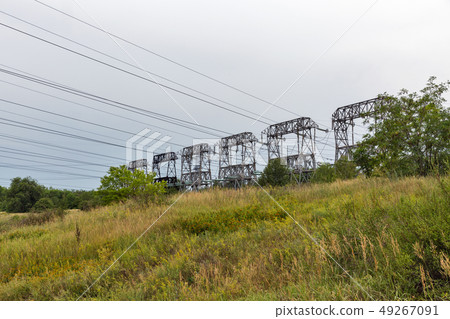 High voltage power lines towers on Khortytsia High voltage power lines towers on Khortytsia 49267091