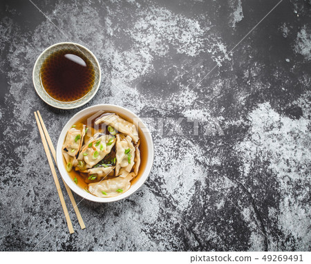 Asian dumplings in bowl Asian dumplings in bowl 49269491
