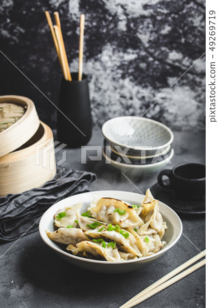 Asian dumplings in bowl Asian dumplings in bowl 49269719