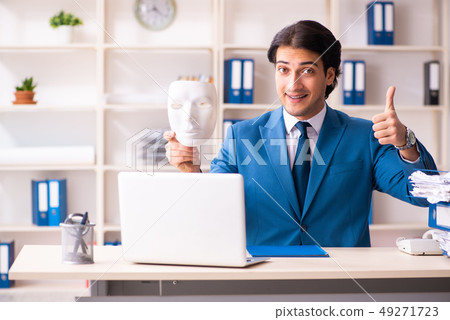 Male employee in the office in industrial espionage concept Male employee in the office in industrial espionage concept 49271723