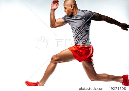 Athletics sportsman demonstrating his amazing running skills 49271808