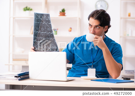 Young handsome doctor radiologist working in the clinic 49272000