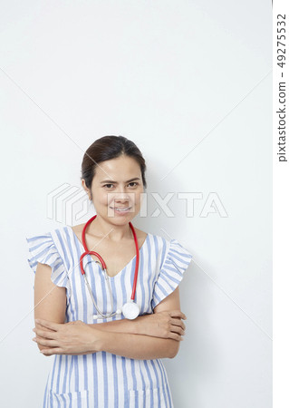 female doctor nurse with red stethoscope 49275532