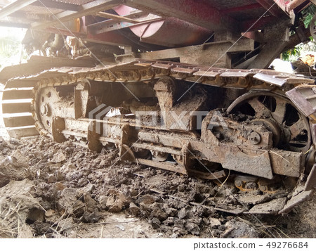 Close-up of Crawler tracks combine harvesters of Close-up of Crawler tracks combine harvesters of 49276684