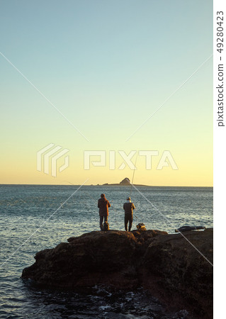 An angler fishing in Jeju Island, Brother Island An angler fishing in Jeju Island, Brother Island 49280423