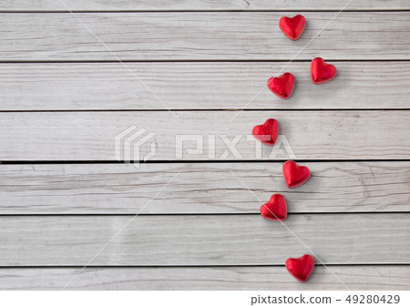 close up of red heart shaped chocolate candies close up of red heart shaped chocolate candies 49280429