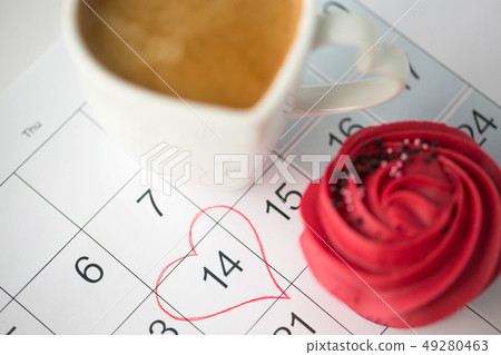 close up of calendar, coffee, cupcake and heart close up of calendar, coffee, cupcake and heart 49280463