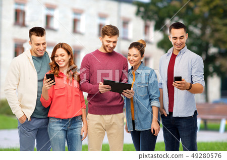 students with smartphones and tablet computer students with smartphones and tablet computer 49280576