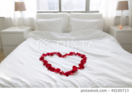 cozy bedroom decorated for valentines day 49280713