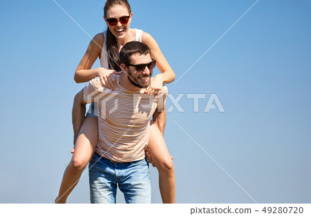 happy couple having fun in summer 49280720