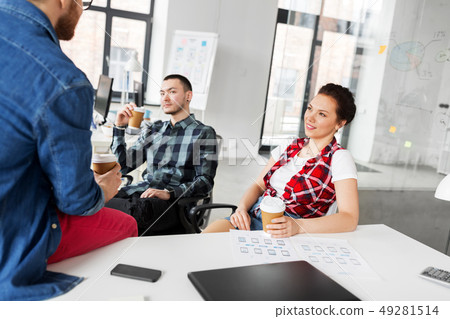 creative team drinking coffee at office creative team drinking coffee at office 49281514