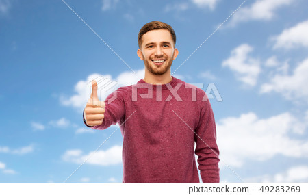 happy young man showing thumbs up happy young man showing thumbs up 49283269