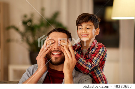 happy father and little son playing at home 49283693