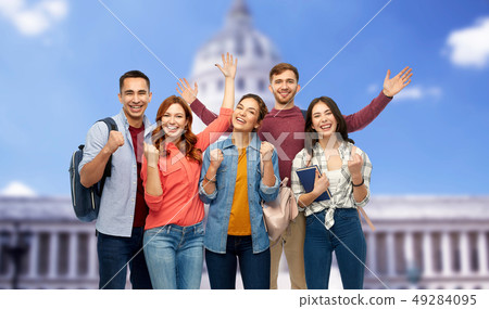 happy students celebrating over capitol building happy students celebrating over capitol building 49284095