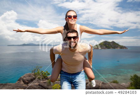 happy couple having fun on seychelles island happy couple having fun on seychelles island 49284103