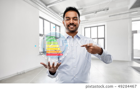 realtor with energy levels over empty office room realtor with energy levels over empty office room 49284467