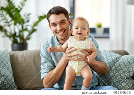 father with little baby daughter at home father with little baby daughter at home 49284666