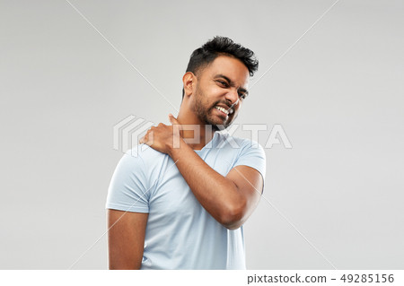 unhealthy indian man suffering from neck pain unhealthy indian man suffering from neck pain 49285156