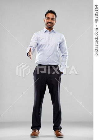 indian businessman stretching hand for handshake indian businessman stretching hand for handshake 49285164