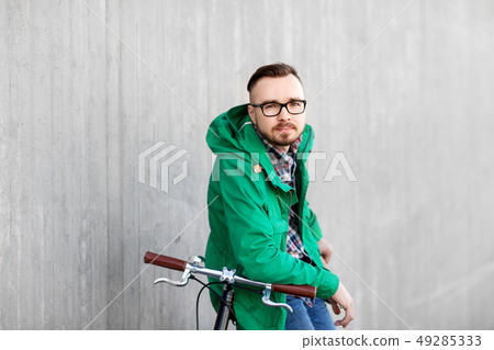 happy young hipster man with fixed gear bike happy young hipster man with fixed gear bike 49285333