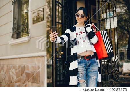 Stylish girl in a city 49285373