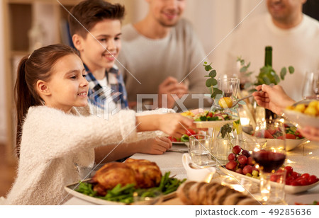 happy family having dinner party at home happy family having dinner party at home 49285636