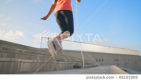 woman sport and rope skipping 49285909